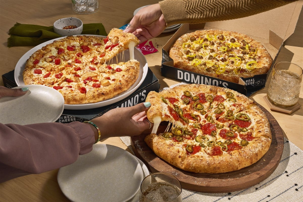 Domino's pizza party delivered to a workplace lunchroom as a free vending machine commission alternative